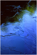 Coloured Ice: Near Squamish, BC, Canada (2003) - Fine art abstract photograph of colors, shapes and reflections in a frozen lake