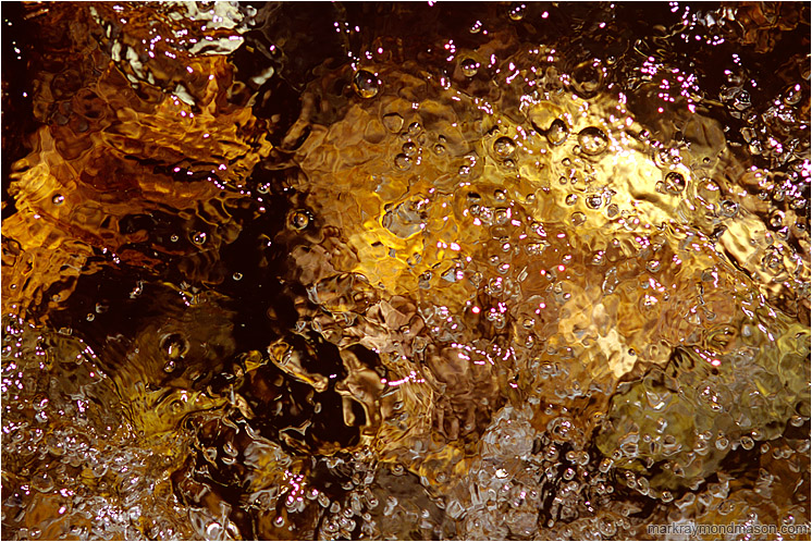 Colourful Sparkling Water: Kananaskis, AB, Canada (2007-00-00) - Abstract photograph of highlights and bubbles in a colourful flowing mountain creek