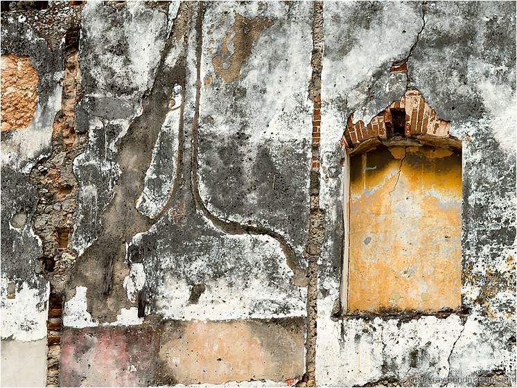 Concrete Wall, Arch, Brick Lines: Havana, Cuba (2017-02-16) - Fine art photo showing a wall next to a demolished structure, the missing adjoining walls clearly visible