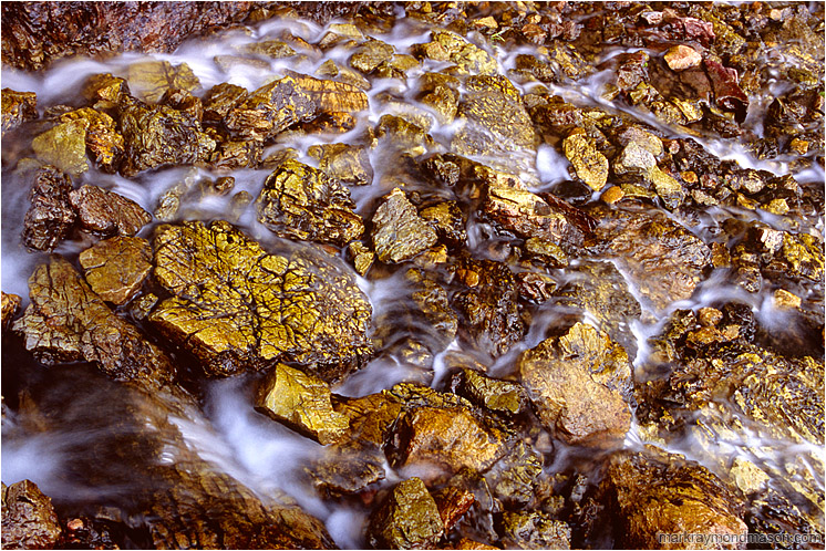 Broken Rocks, Stream: Limestone Lakes, BC, Canada (2007-00-00) - Fine art abstract photograph of an alpine stream flowing around broken yellowed limestone blocks
