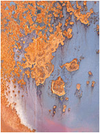Clouded Rust: Near Gang Ranch, BC, Canada (2011) - Abstract photograph of swirled red rust on the surface of a bluish painted metal plate