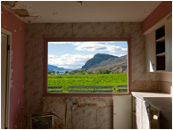 Broken Room, Picture Window: Near Kamloops, BC, Canada (2012) - Fine art photograph of a window in a derelict house with missing glass but a beautiful pastoral and mountain view