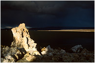 Tuffa, Storm: Mono Lake, CA, USA (2002) - Fine art photograph of a salt tuffa and an approaching storm cloud