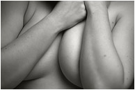 Terri, Covered (B&W): Calgary, AB, Canada (2008) - Fine art black and white nude photograph of a woman with her arms crossed over her breasts