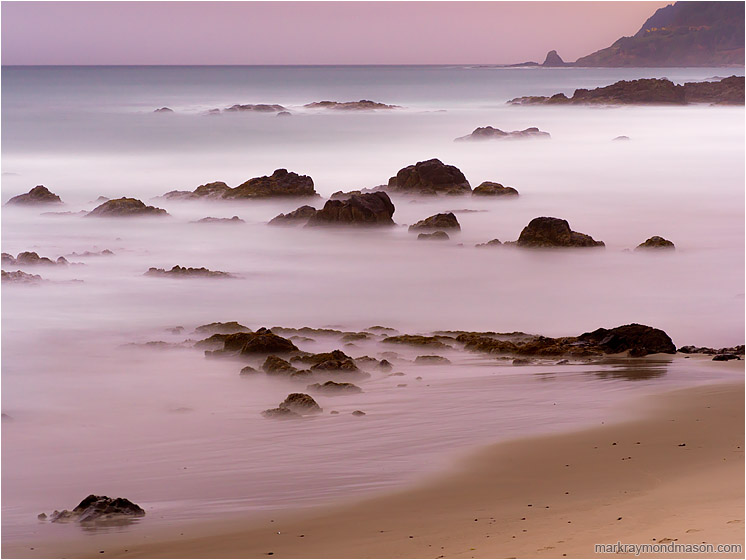Rising Mountains, Misty Sea: Near Stawberry Hill Park, OR, USA (2015-10-21) - Fine art landscape photograph of misty water around rocky islands in the last light of a coastal evening